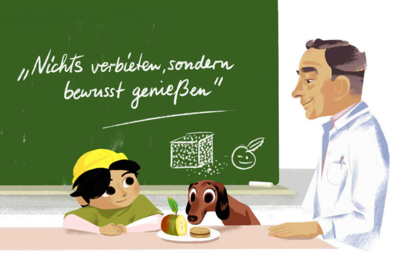 "Nichts verbieten, sondern bewusst genießen" Prof. Dr. Hans Hauner sitzt mit Basti und Bella an einem Tisch, vor ihnen ein Teller mit einem Apfel und einem Schokoladenkeks.