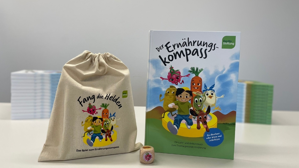 Abbildung des Lehr- und Aktionsbuches Der Ernährungskompass mit dem dazugehörigen Spiel Fang die Helden